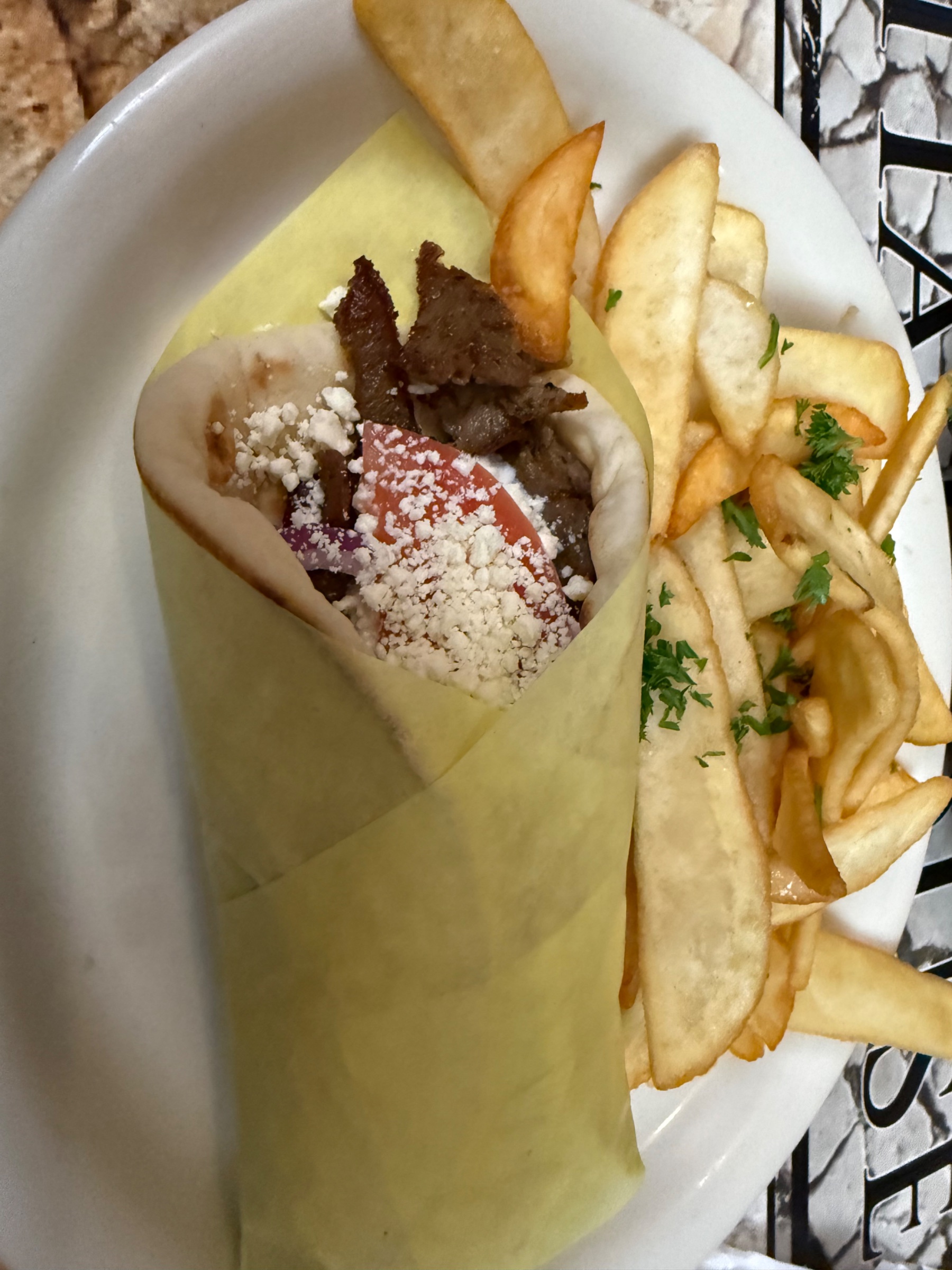 How is gyro meat typically prepared?