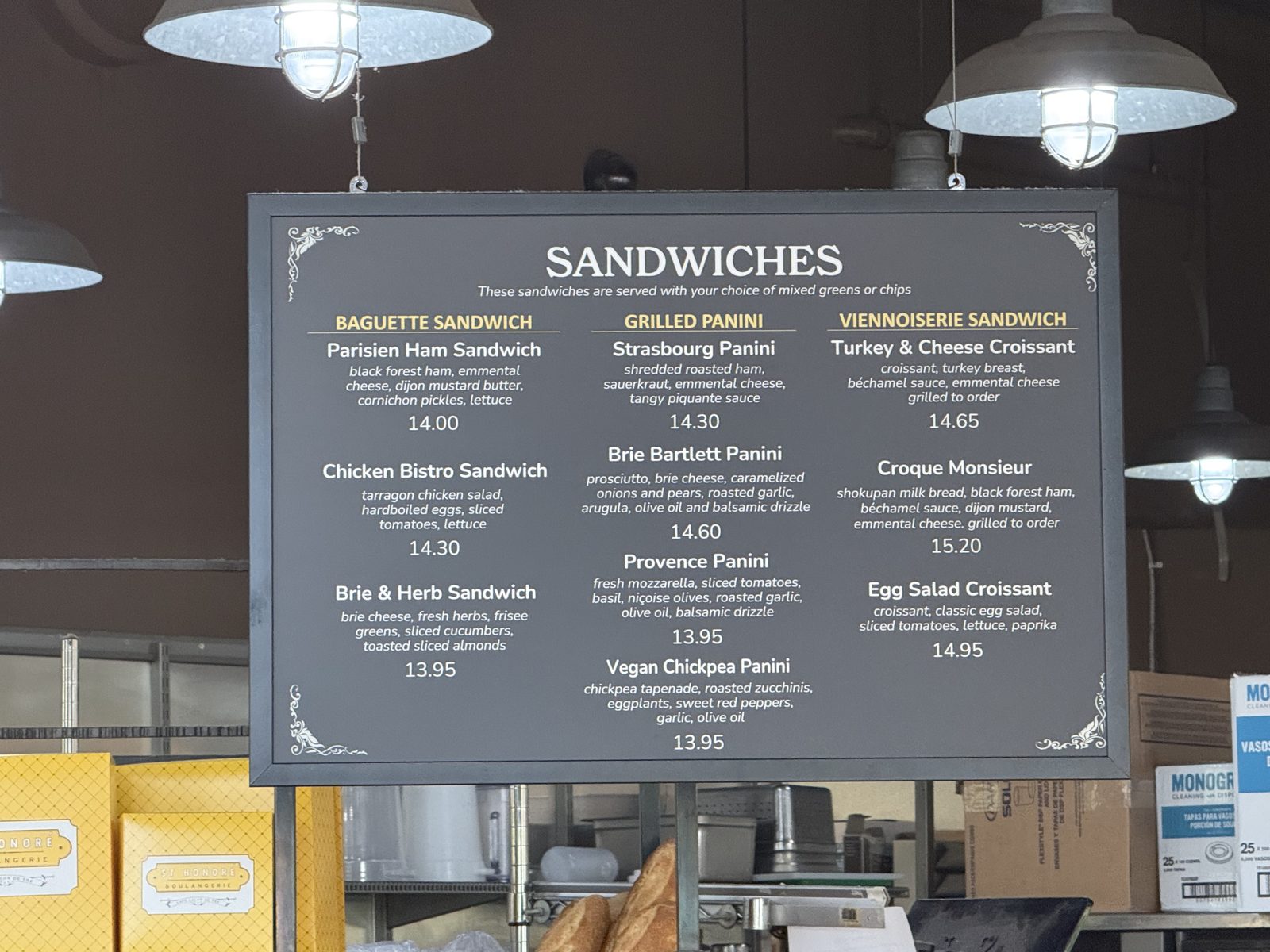 The sandwich board — three columns, the Brie Bartlett Panini second from the top of the middle one.