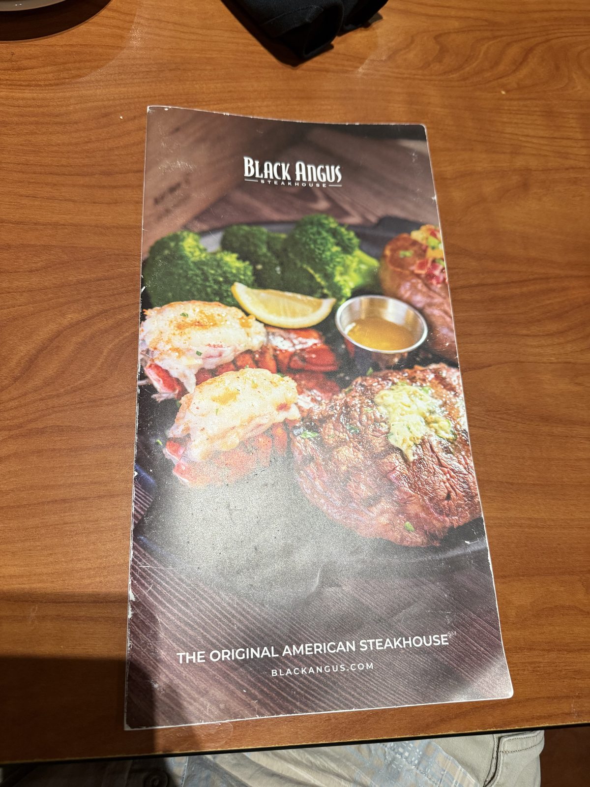 The menu cover. The tagline is a real claim, not just marketing — see above.