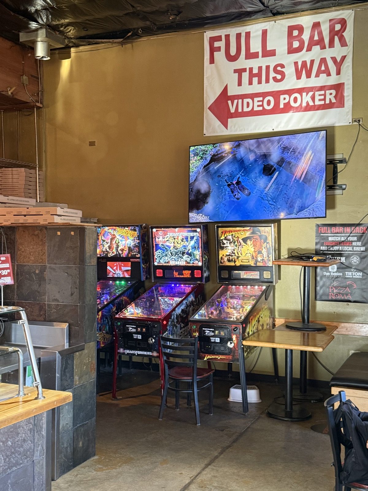 The back room. Pinball, video poker, and a TV over the machines.