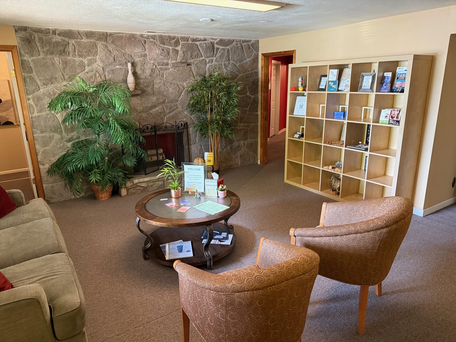 The lobby, stone fireplace and all.