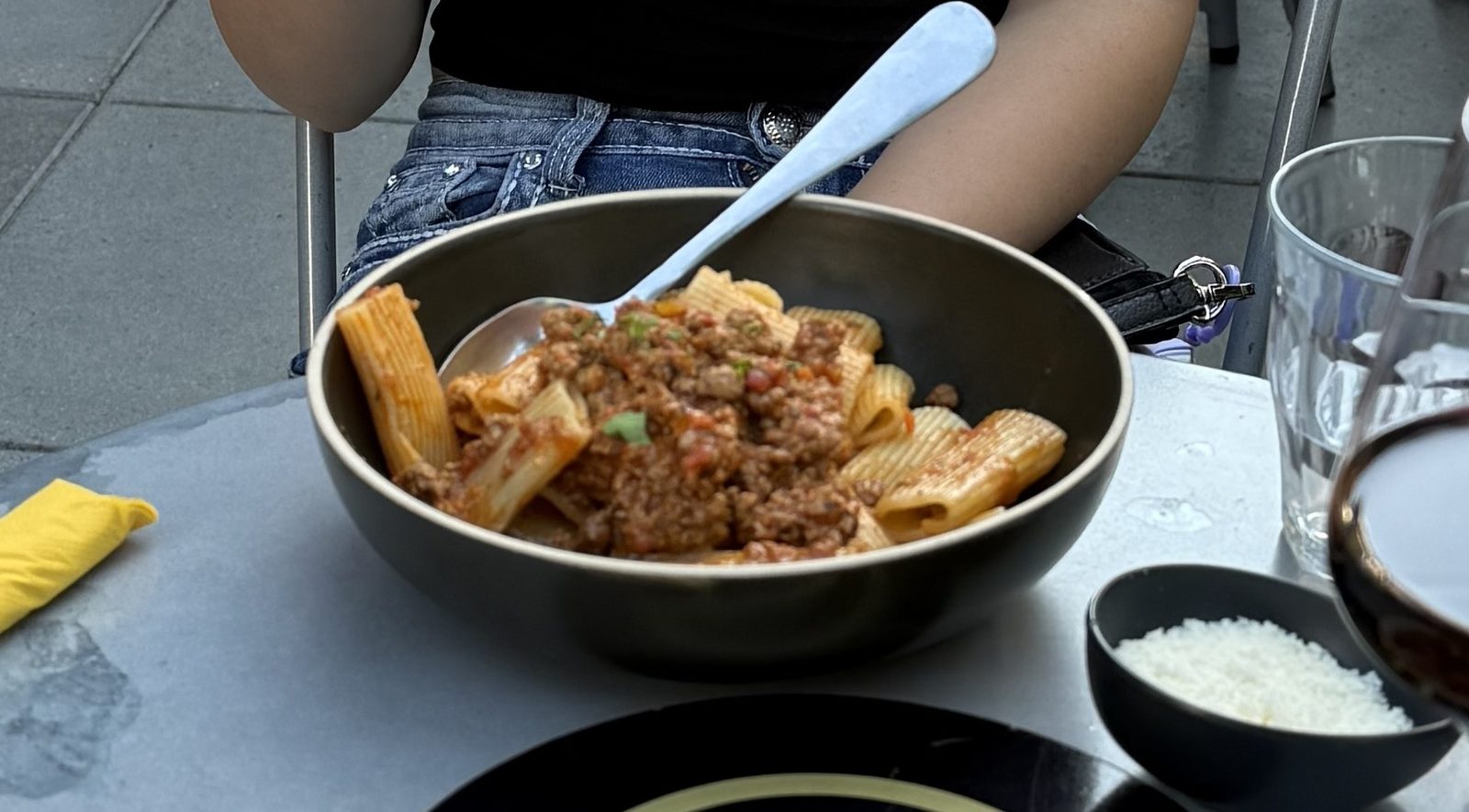 Rigatoni, house meat sauce, parmesan, parsley. Sixteen dollars and no adjectives.