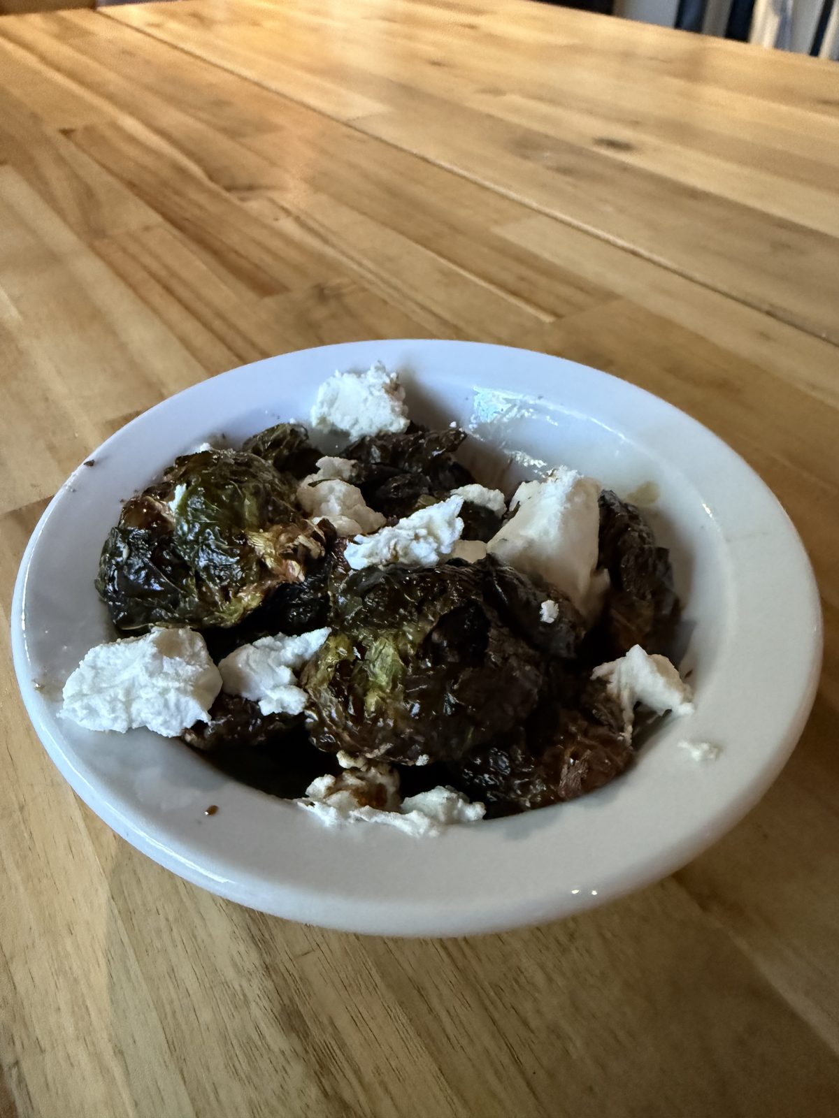 Five dollars, plus two for the goat cheese. Not for me — but handsomely done.