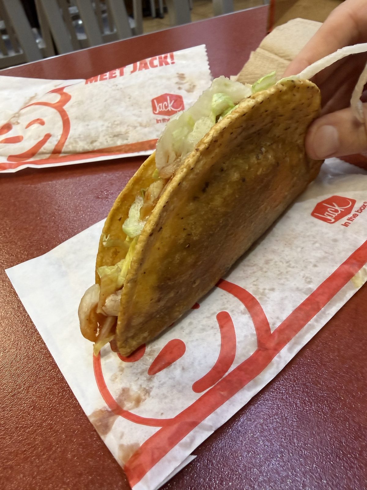 Held up for inspection. The shell holds together better than the question of what's inside it.